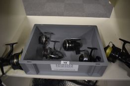 A tray of 6 vintage spinning reels including an Abu Garcia gold max 507mk2, A Shimano custom x