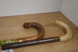 A crook style walking stick with an antler handle measuring 104cm and a chestnut walking stick