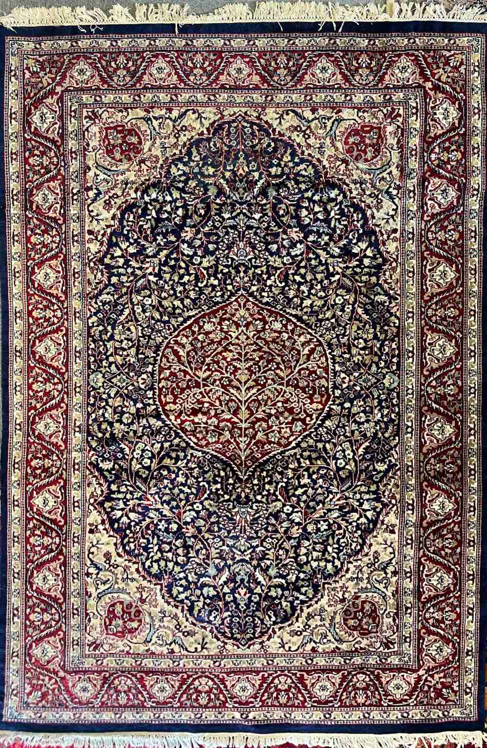 A 20th century vintage Iranian rug with an Abrashed cobalt ground ...