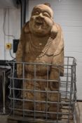 An impressive and monumental Chinese carved wooden Budai/laughing Buddha figure, modelled holding