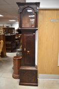 An 18th Century oak cased long case clock having eight day movement with brass dial named for Joseph