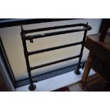 A vintage copper heated towel rail, width approx. 85cm
