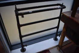 A vintage copper heated towel rail, width approx. 85cm
