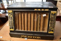 A vintage shop counter display , dentistry related, for Meritor toothbrushes, having glazed