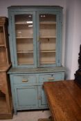 A late 19th or early 20th Century painted kitchen cabinet having glazed top, width approx. 100cm