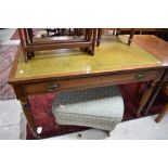 A 19th century leather topped mahogany writing table, of rectangular form with inset leather
