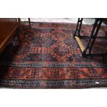 A Persian style carpet square having red ground