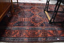 A Persian style carpet square having red ground