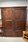 A 19th Century oak shallow panelled cupboard (some signs of historical worm to back) dimensions