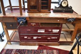 A traditional wooden work bench with vices attached and drawers under, width approx. 183cm