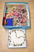 An assortment of costume jewellery, including faux pearls, beaded jewellery and cufflinks