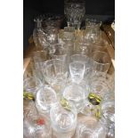 A large selection of assorted glasses including pint glasses and Strongbow advertising tankards sold