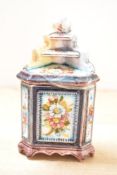 A decorative Continental 20th-century classical-style ceramic trinket box and cover, hand-scored for