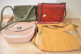 A selection of modern faux leather handbags, to include examples by Fiorelli and Accessorize, (4),