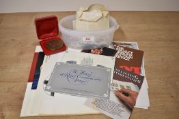 A small selection of memorabilia including a small selection of loose stamps and first day covers, a