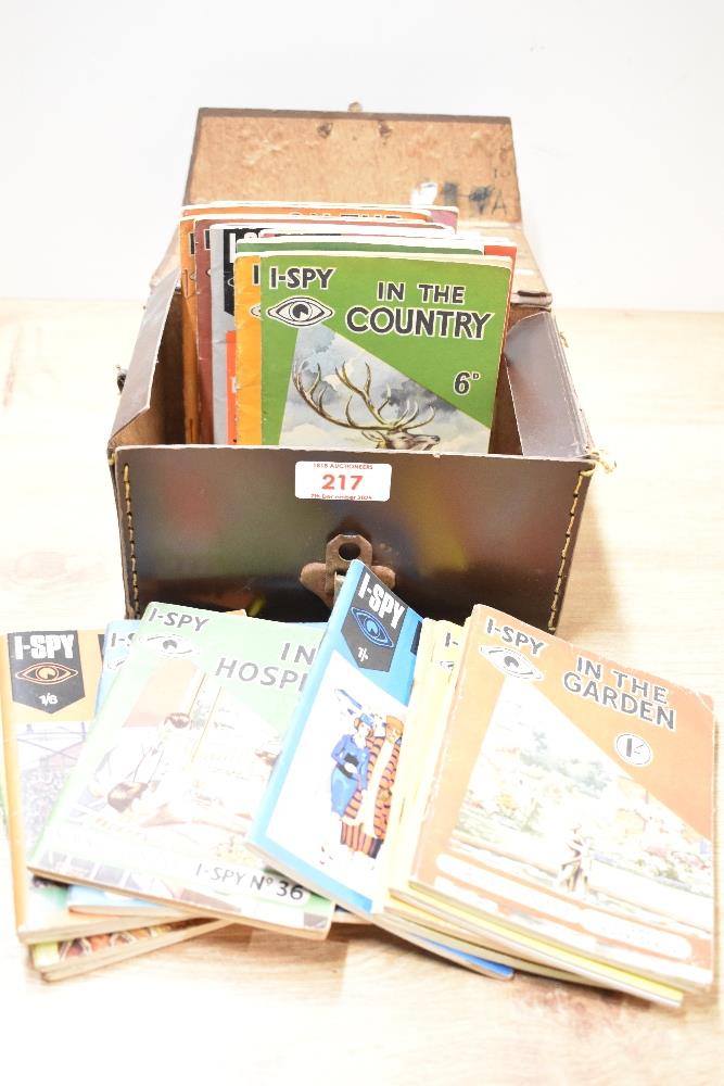 A collection of vintage I-SPY news chronicle booklets, various, housed in a stitched card case.