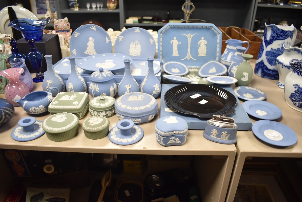 A large selection of Wedgwood Jasperware items to include pin dishes, trinket dishes, candle holder,