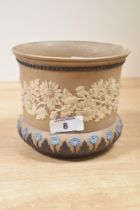 A Victorian Doulton Silicon stone ware vase by Mary Budden (listed in 1882 as a Junior Assistant