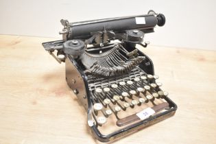 An early 20th-century Italian Juventa Standard portable typewriter, model number 5, featuring a