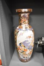 A tall 20th-century Chinese porcelain vase, of baluster form decorated with colourful birds to