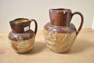 Two Victorian Doulton Lambeth stoneware harvest jugs, each decorated with applied relief