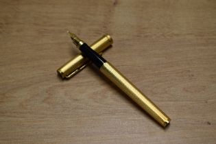 A boxed Parker Premier converter fill fountain pen in Gold Plate having Parker 750 France nib