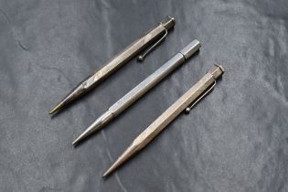 Three hexagonal Yard o Led mechanical pencils. Two Sterling Silver with wave engine turning
