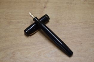 A Mentmore BHR button fill fountain pen with narrow cap band having Mentmore Osmi Iridium 14CT