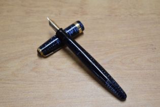 A Parker Vacumatic in Blueberry with broad cap band having Parker USA 4 nib