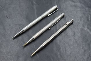 Three Yard o Led hallmarked Silver mechanical pencils. Dated London 1952 (engraved) and Birmingham