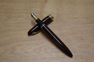 A Sheffer Lifetime 875 lever fill fountain pen in Brown having Sheaffer 14K Made in USA nib. Circa