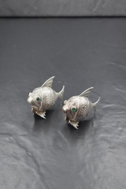 A pair of 20th century Spanish white metal 915. grade novelty salt and pepper, in the form of fish