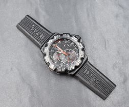 A TAG Heuer Formula 1 Quartz Chronograph Big Date 44 Titanium wristwatch, the black dial having