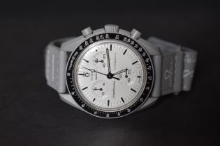 An Omega x Swatch Speedmaster Moonswatch, Mission to the Moonphase 1965 wristwatch, the white dial