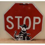 An interesting unauthorised 'BanksyLand' Banksy Retrospective American stop sign, (painted metal