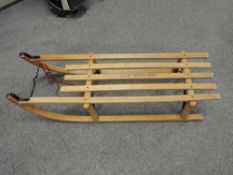 Vintage Davos Rufus Reid Wooden Sleigh having metal runners, in very good condition, length 100cm