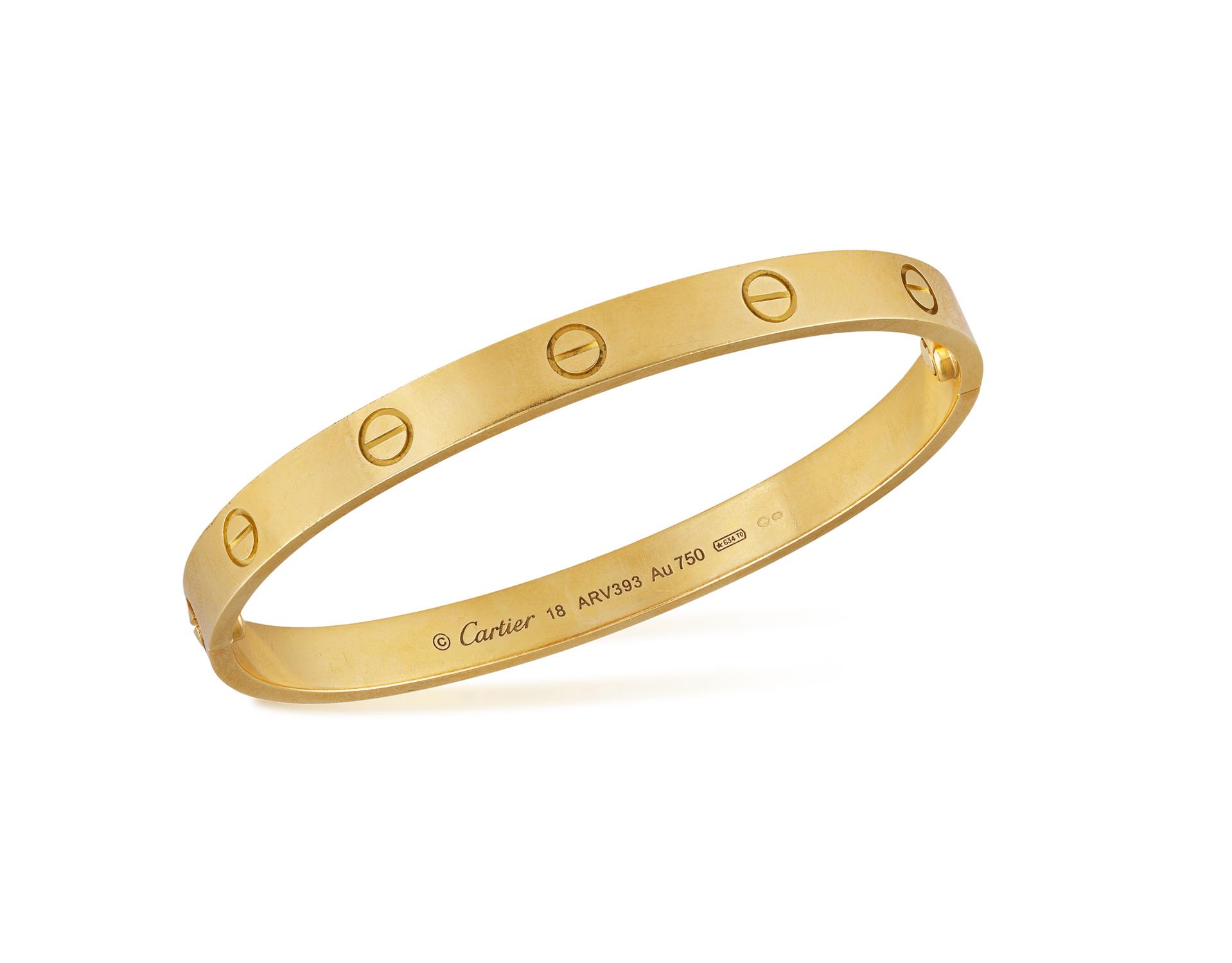 cartier-an-18k-gold-love-braceletthe-hinged-bangle-decorated-with