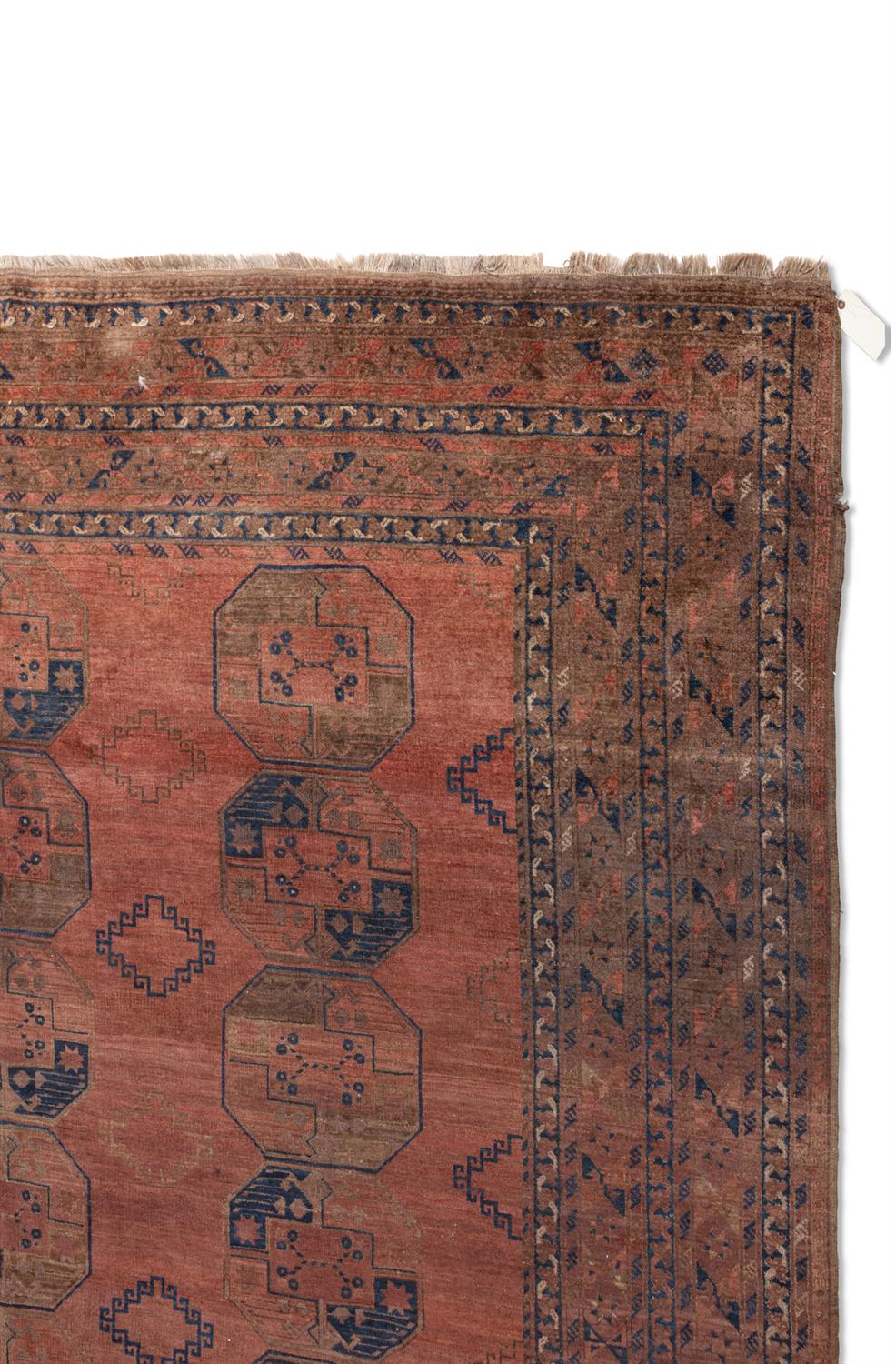 A SEMI-ANTIQUE AFGHAN CARPET, TURKOMAN, C. 1910, 393 X 308CM the "goldwashed" carpet decorated - Image 3 of 4