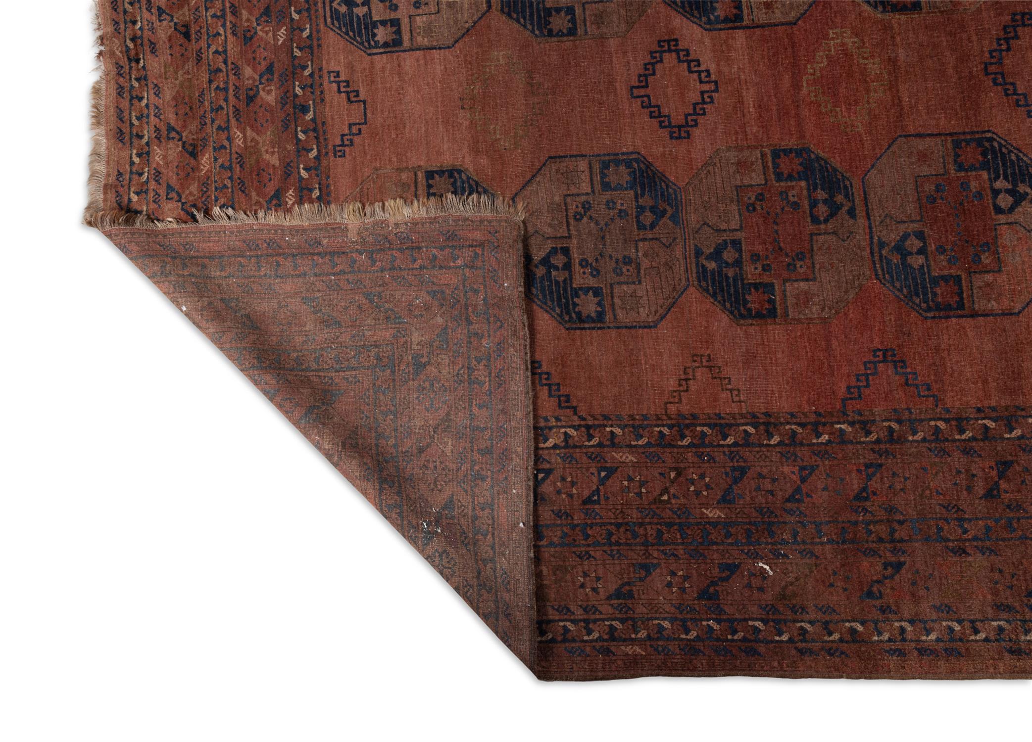 A SEMI-ANTIQUE AFGHAN CARPET, TURKOMAN, C. 1910, 393 X 308CM the "goldwashed" carpet decorated - Image 4 of 4