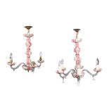 TWO SEVRES STYLE PINK AND WHITE PORCELAIN CHANDELIERS one five branch, the other three branch,