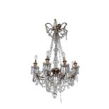 A 19TH CENTURY BRASS FRAMED AND CUT GLASS EIGHT LIGHT CHANDELIER the brass corona with scroll