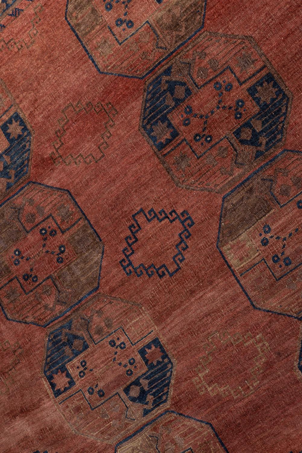 A SEMI-ANTIQUE AFGHAN CARPET, TURKOMAN, C. 1910, 393 X 308CM the "goldwashed" carpet decorated - Image 2 of 4