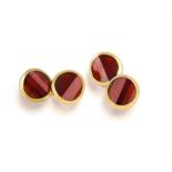 POMELLATO: A PAIR OF GARNET CUFFLINKS Each undulated circular mount set with faceted garnets,