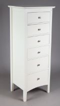 A white-finish tall upright chest fitted six long drawers with silvered-metal knob handles, & on