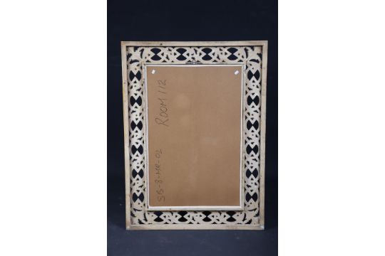 A large rectangular wall mirror in a silvered-finish frame having a pierced foliate border, & - Image 3 of 4