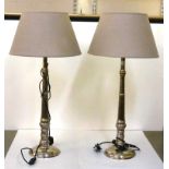A pair of chrome finished table lamps with turned columns  32"h