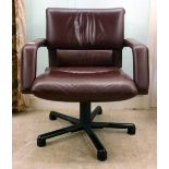 A Vitra Bellini Collection design rotating office chair, upholstered in red hide