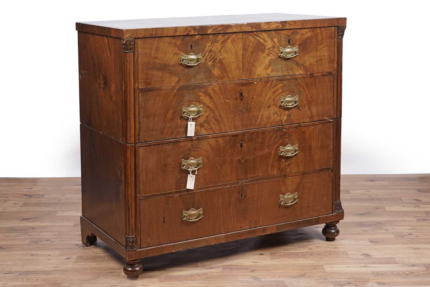 A Victorian mahogany campaign chest of drawers