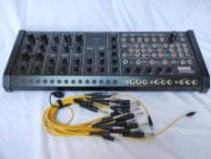 A Korg MS-20M Desktop Module with Patch Cables - A fully built kit of the MS-20M synthesiser
