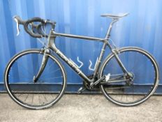 A Planet X Superlight Pro Carbon Road Bike, from around 2010. Frame size 56cm. 10 Speed Cassette.